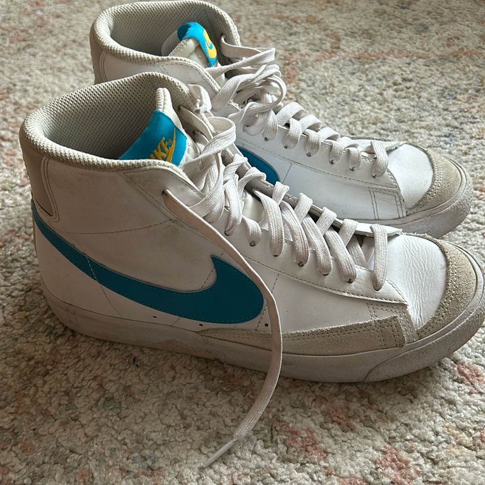 Nike blazers with teal and yellow detail.